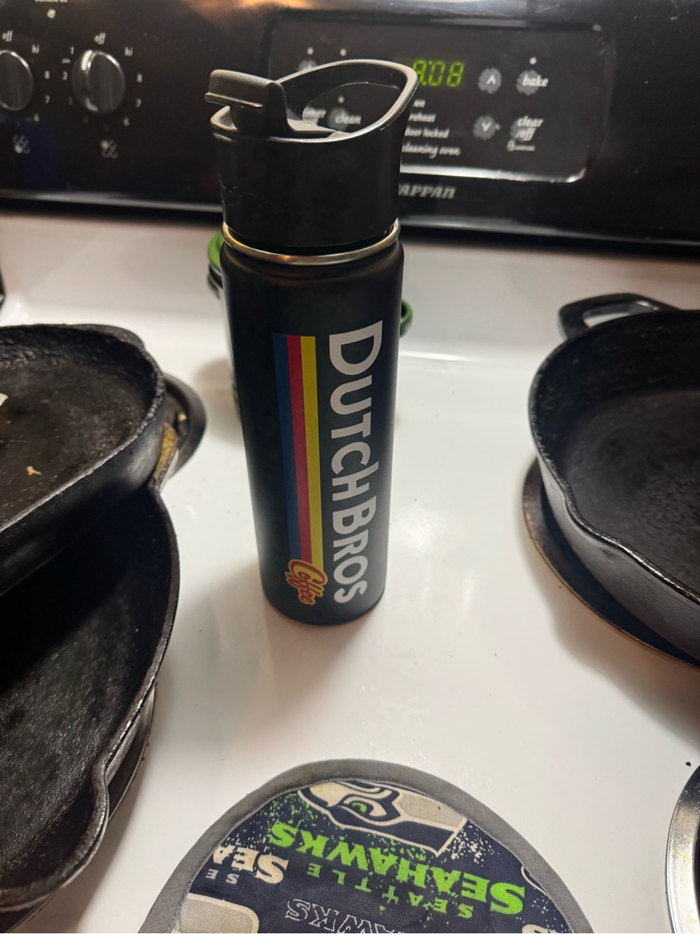 Dutch Bros Matte Black Bottle with Vertical Rainbow Stripe